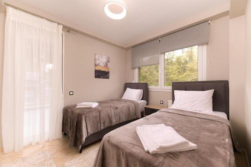 Giường trong phòng chung tại VALLEY Premium House