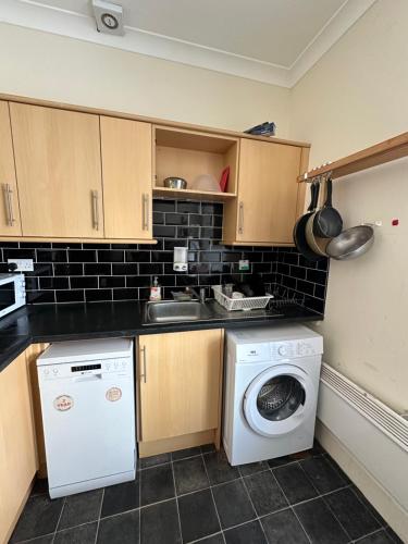 Kuchyň nebo kuchyňský kout v ubytování Central Retreat on Sauchiehall Street