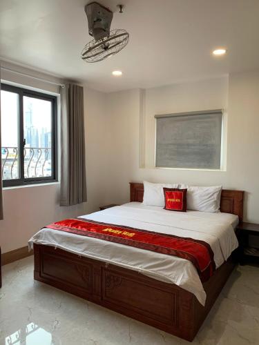 Llit o llits en una habitació de Apogee Hotel