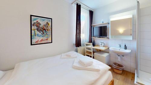 Ένα ή περισσότερα κρεβάτια σε δωμάτιο στο Residenz am See Zimmer 009