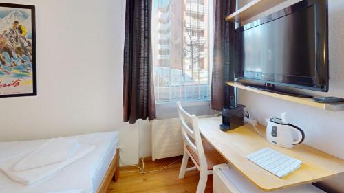 Ένα ή περισσότερα κρεβάτια σε δωμάτιο στο Residenz am See Zimmer 009