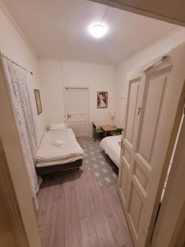 Ένα ή περισσότερα κρεβάτια σε δωμάτιο στο Hus Gasstorp