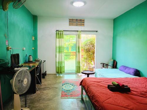 En eller flere senge i et værelse på Six Nature Resort