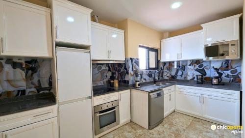 Cuina o zona de cuina de Chic studio with parking and rooftop