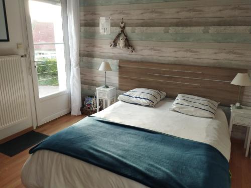 Ένα ή περισσότερα κρεβάτια σε δωμάτιο στο Chambre d'Hotes Pause en Chemin