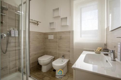 Et badeværelse på Coho House Fiumicino