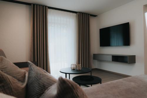 TV a/nebo společenská místnost v ubytování Apart Kraxner