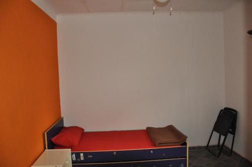Кровать или кровати в номере Sanchaba Yellow Apartments