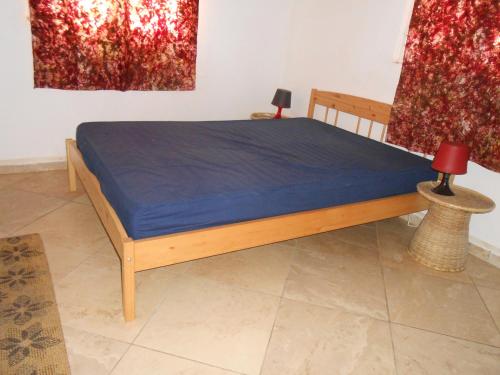 Кровать или кровати в номере Sanchaba Yellow Apartments
