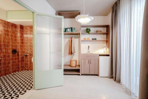 Kuchyň nebo kuchyňský kout v ubytování Dogpound Hotel