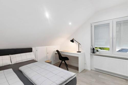 Ένα ή περισσότερα κρεβάτια σε δωμάτιο στο Ferienwohnung BlackForest