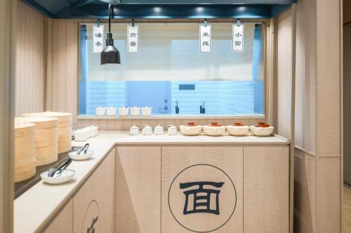 Ảnh trong thư viện ảnh của Hanting Hotel Chongqing Shapingba Railway Station Three Gorges Square ở Trùng Khánh