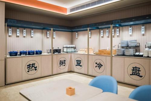 Tiện nghi pha trà/cà phê tại Hanting Hotel Chongqing Shapingba Railway Station Three Gorges Square