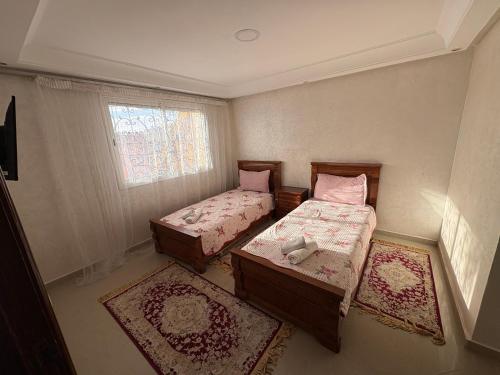 Postel nebo postele na pokoji v ubytování VILLA Dar BOUAZZA, Vue sur mer, 200m de la plage