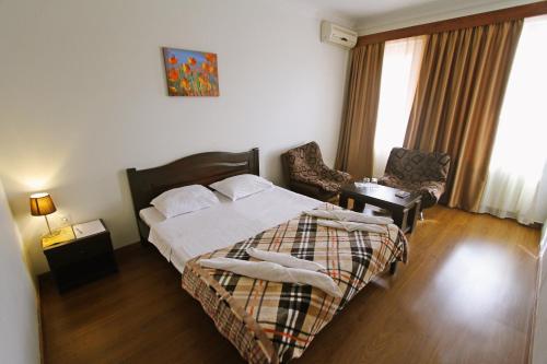Katil atau katil-katil dalam bilik di Hotel Lux