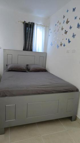 Ένα ή περισσότερα κρεβάτια σε δωμάτιο στο Rosanna