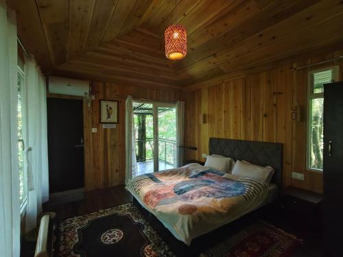 Ένα ή περισσότερα κρεβάτια σε δωμάτιο στο Lenzila Retreat