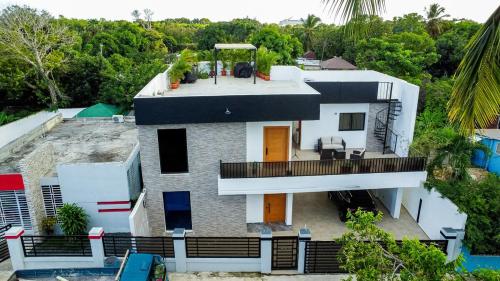 Φωτογραφία από το άλμπουμ του Casa moderna cerca de Casa de Campo con Wi-Fi profesional y espacio para 8 personas σε La Romana