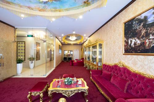 a living room with a couch and a table at Ladalat Hotel in Da Lat