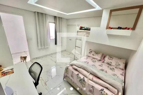 Ένα ή περισσότερα κρεβάτια σε δωμάτιο στο Aconchego de Lugar - Eri & Douglas