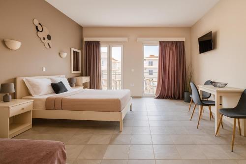 Postel nebo postele na pokoji v ubytování Ilios Mare Hotel