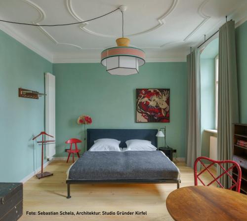 Ένα ή περισσότερα κρεβάτια σε δωμάτιο στο Schulze am Markt