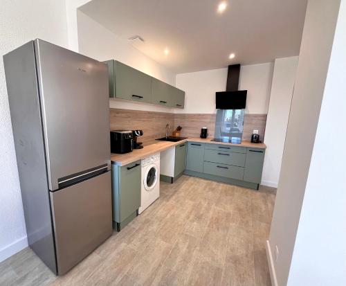 Η κουζίνα ή μικρή κουζίνα στο L'escapade du Port - T2 Spacieux Palavas-les-Flots