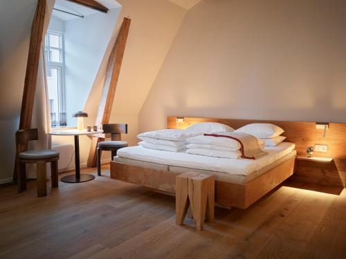Llit o llits en una habitació de Hotel 1904