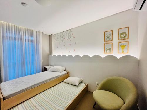 En eller flere senge i et værelse på Galapagos1402 - Cobertura com Hidro e Jacuzzi Privativas