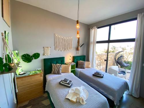 Кровать или кровати в номере Villa Tafoukt Taghazout