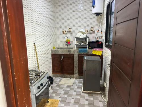 Kuchyň nebo kuchyňský kout v ubytování Boris N1