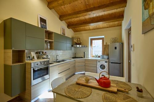 O bucătărie sau chicinetă la Casa Vicolo TerminIO