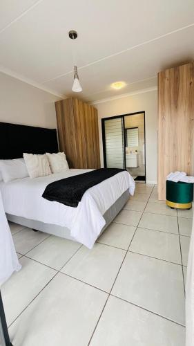 Ένα ή περισσότερα κρεβάτια σε δωμάτιο στο The Legacy at The Blyde