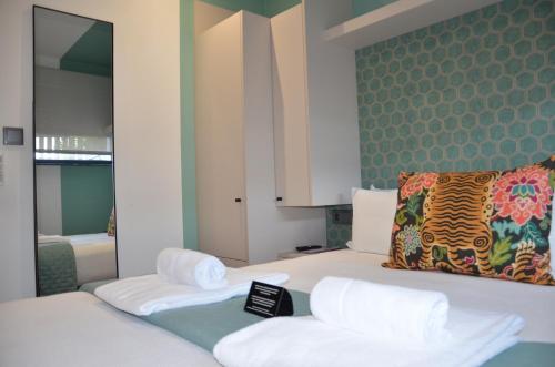 Postel nebo postele na pokoji v ubytování Alma Candida 15