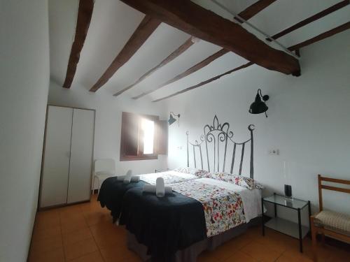 Ένα ή περισσότερα κρεβάτια σε δωμάτιο στο Casa de los deseos