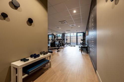 Phòng/tiện nghi tập thể dục tại Nemea Appart Hotel Coeur Europe Strasbourg Illkirch