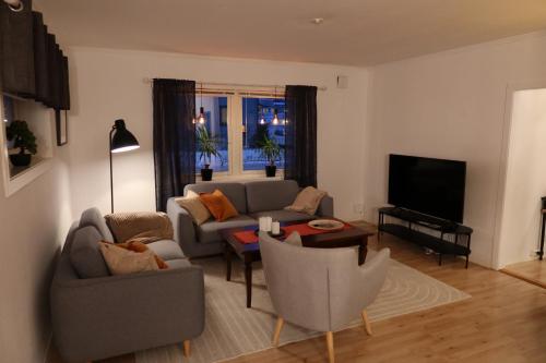 Χώρος καθιστικού στο The Urban Escape Walk to Train, Bus & City Center