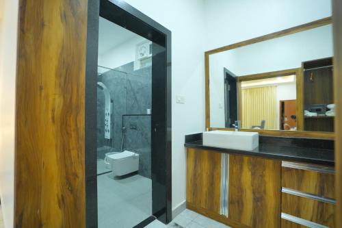 Et badeværelse på Tripura Resort