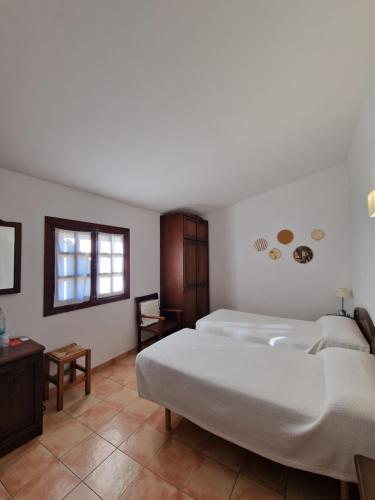 Postel nebo postele na pokoji v ubytování Can Font