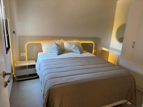 En eller flere senge i et værelse på Soho 2 Dorm