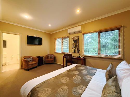 Кровать или кровати в номере Deluxe Villa - Circa 1860s Homestead