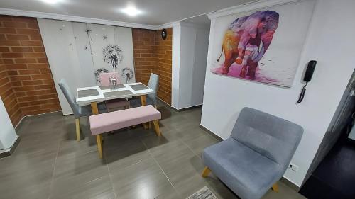 Un lugar para sentarse en Apartamento para descansar 2
