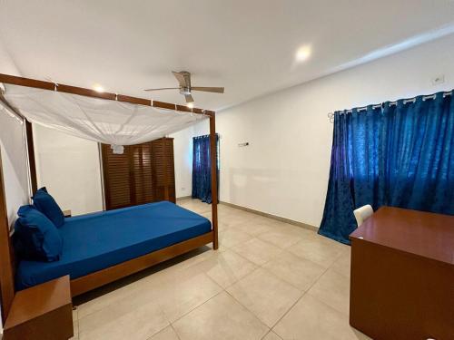 Ένα ή περισσότερα κρεβάτια σε δωμάτιο στο Villa Khadidja - a Home away from Home