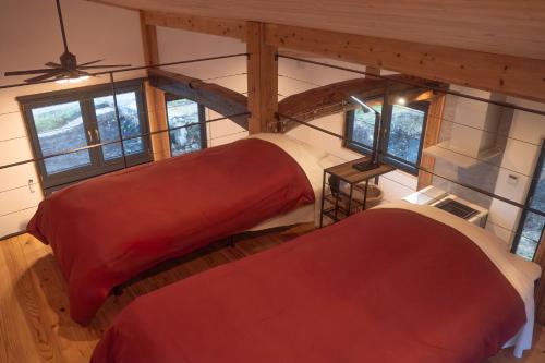 Ένα ή περισσότερα κρεβάτια σε δωμάτιο στο New Field Chalet 白馬