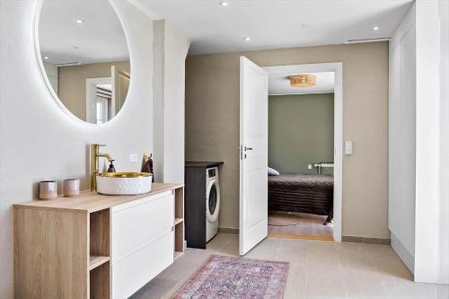 a bathroom with a sink and a mirror at 193-Vestervig-Vesterhavsvej-36 in Vestervig