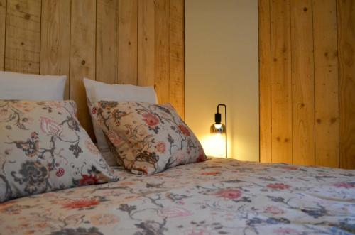 Postel nebo postele na pokoji v ubytování Le Relais d'Hubert