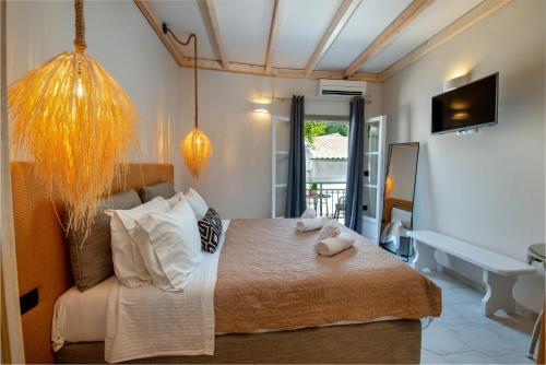 En eller flere senge i et værelse på Arokaria Studios