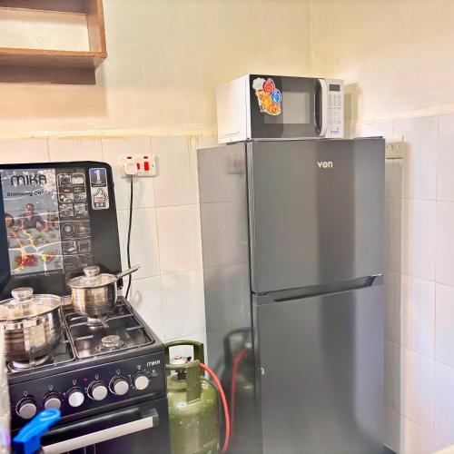 Кухня или мини-кухня в EldoTeriki Homes
