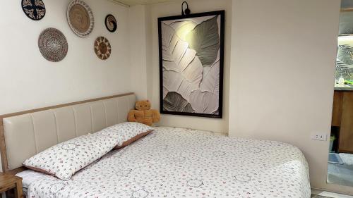 Postel nebo postele na pokoji v ubytování Hanoi An - 1'walk to Hoan Kiem lake - Hanoi Center