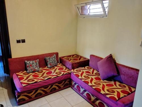 Postel nebo postele na pokoji v ubytování Ain Mzwar Marrakech